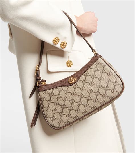 gucci beige gg supreme mini ophidia bucket bag|Gucci Ophidia GG small bag.